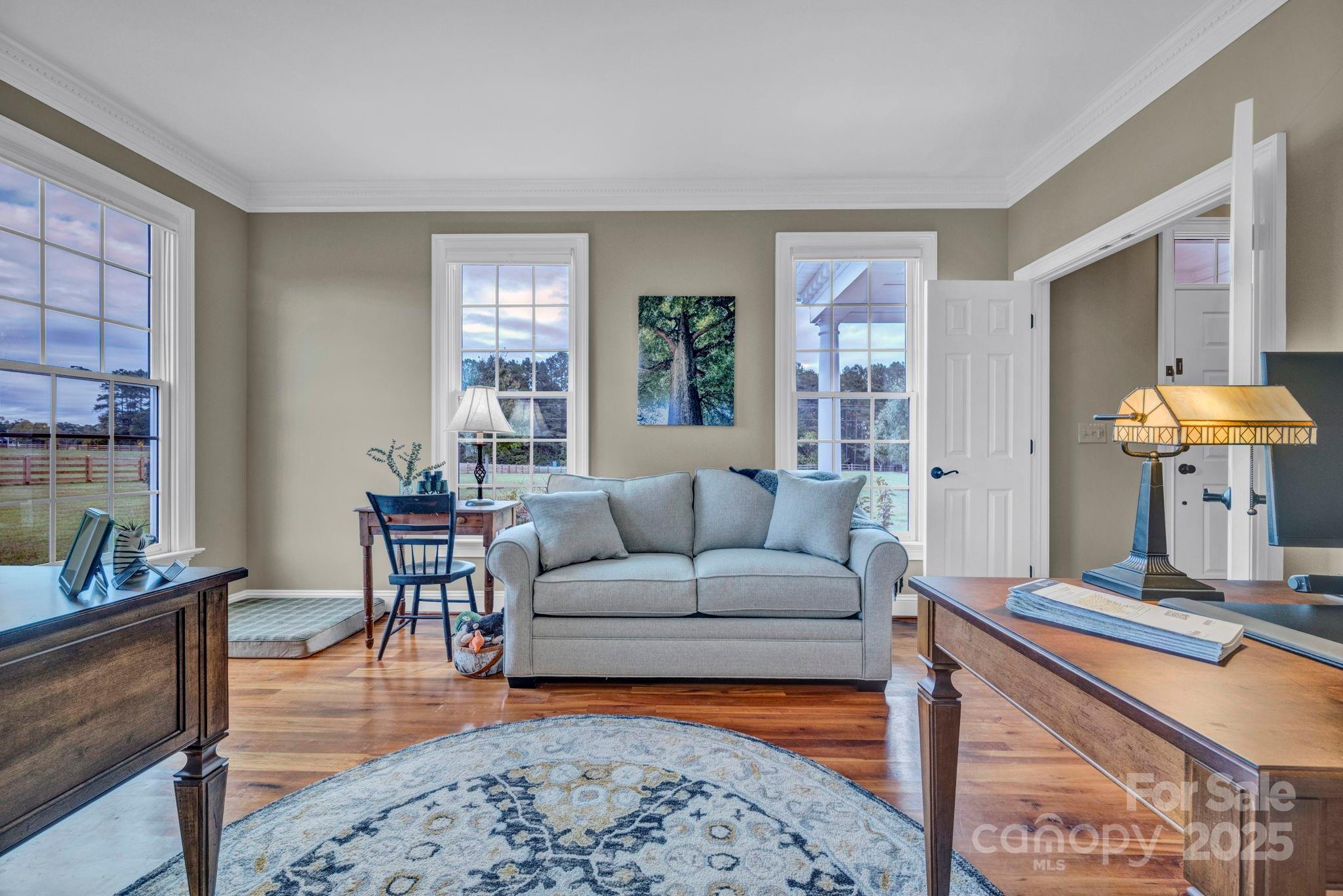 400 Ratledge Road Mocksville, NC 27028 - Photo 9 of 48 a living room with furniture a rug and a window