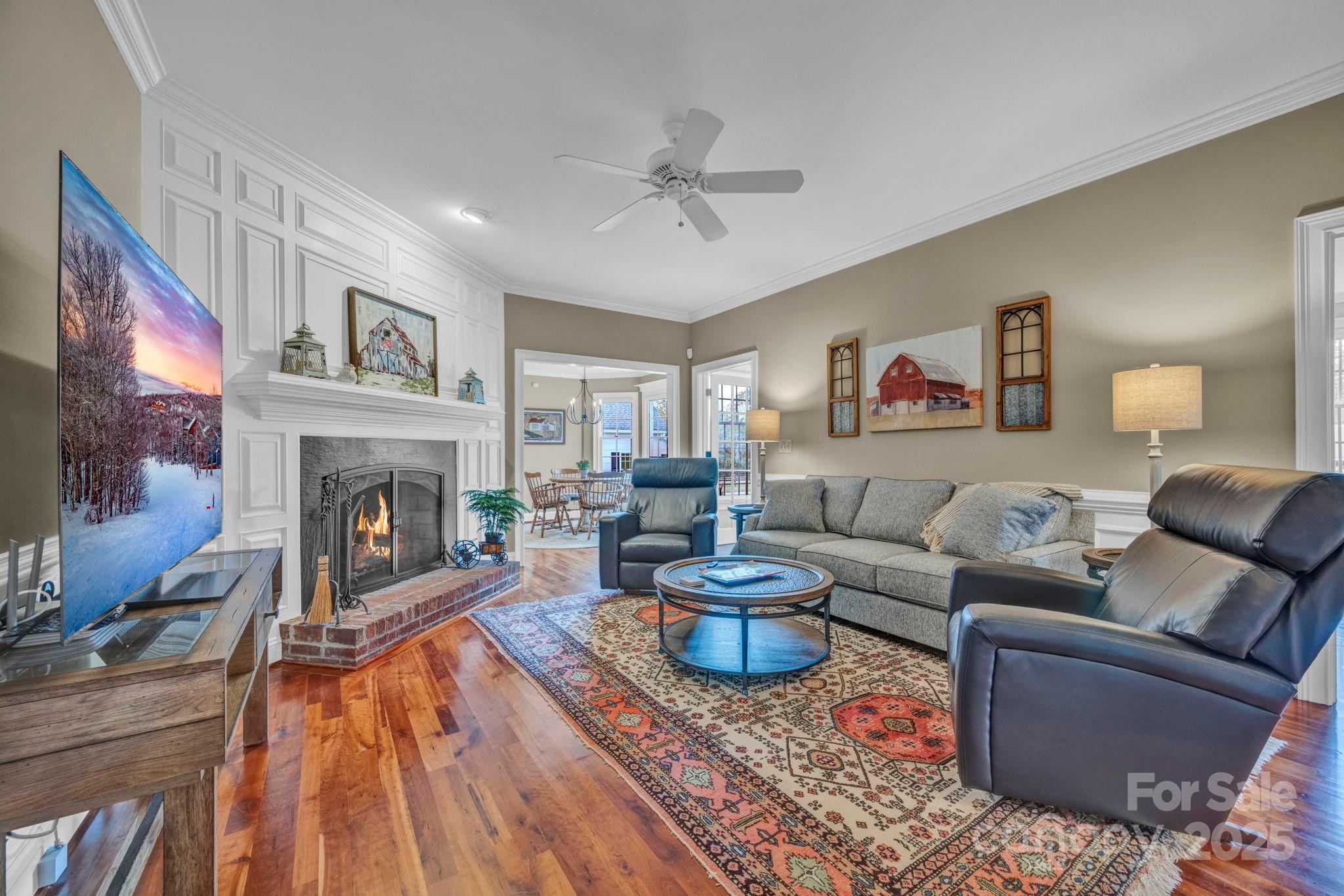 400 Ratledge Road Mocksville, NC 27028 - Photo 10 of 48 a living room with furniture and a fireplace