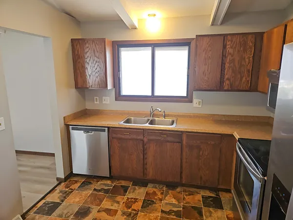 $317,400 | 10810 Linwood Forest Drive, Champlin, MN 55316