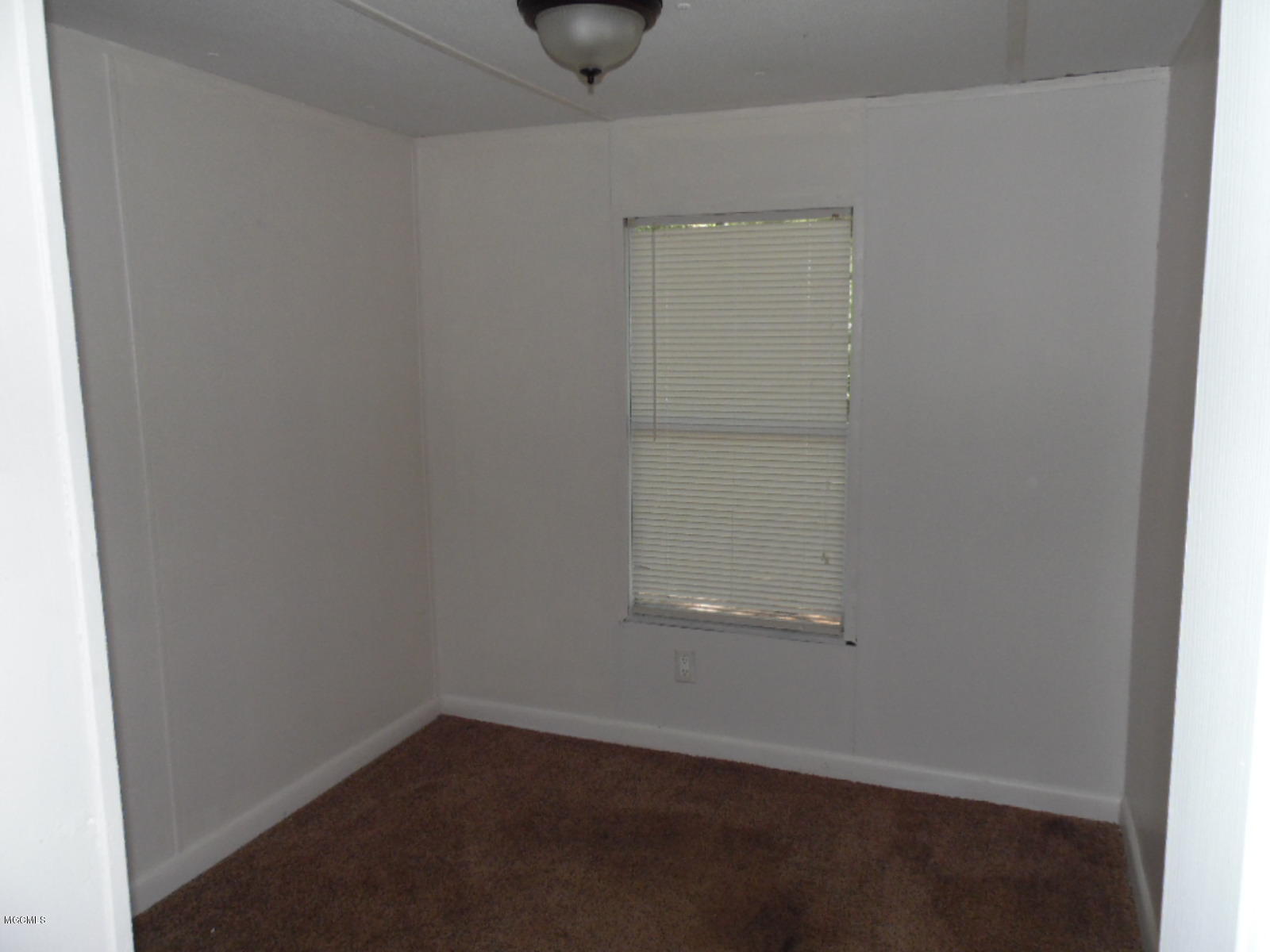 11151 Grace Road Pass Christian, MS 39571 - Photo 15 of 22 mobile home bedroom 1