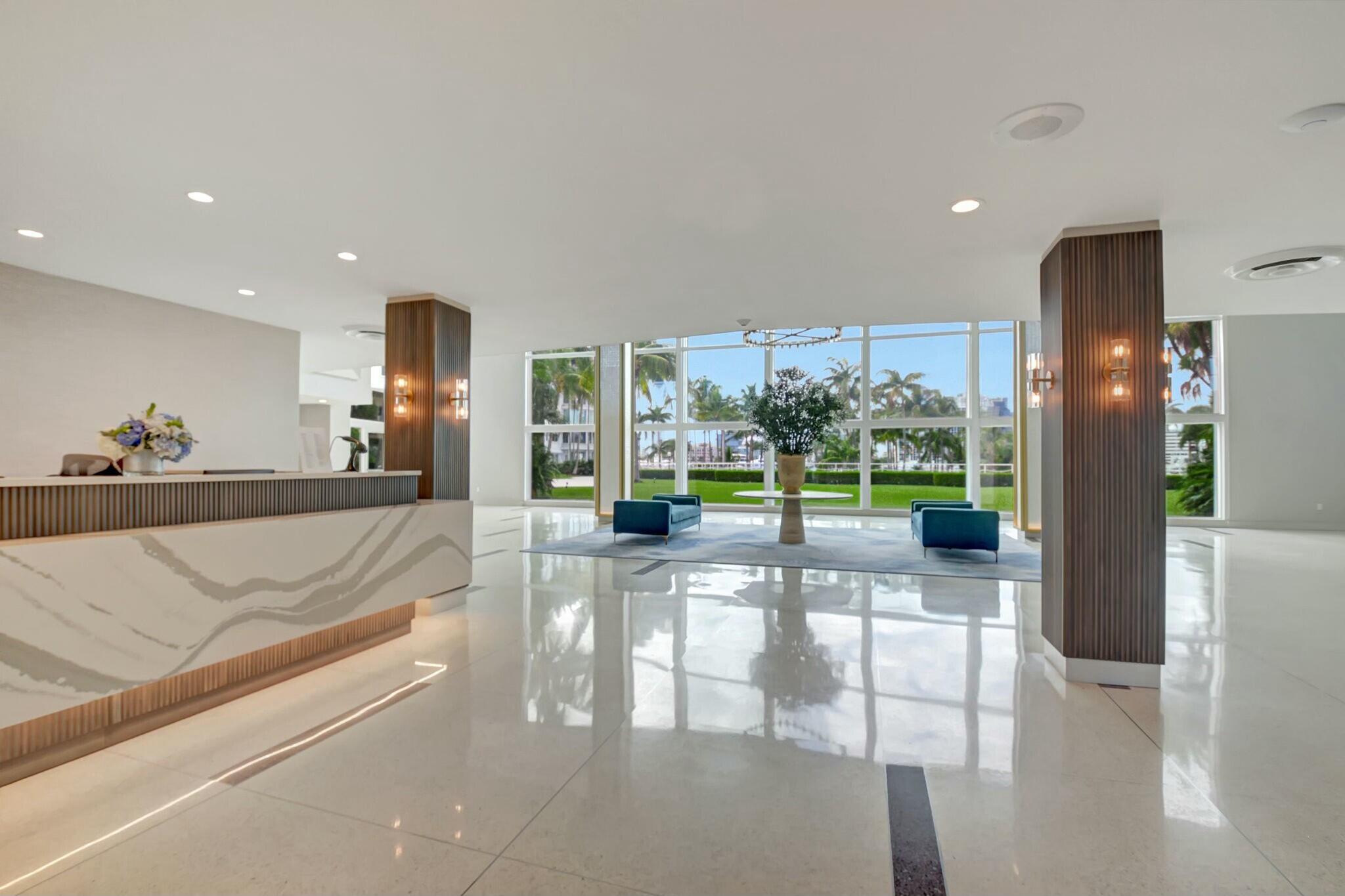44 Cocoanut Row, Unit 104A Palm Beach, FL 33480 - Photo 19 of 26 a view of a living room and floor to ceiling window or kitchen