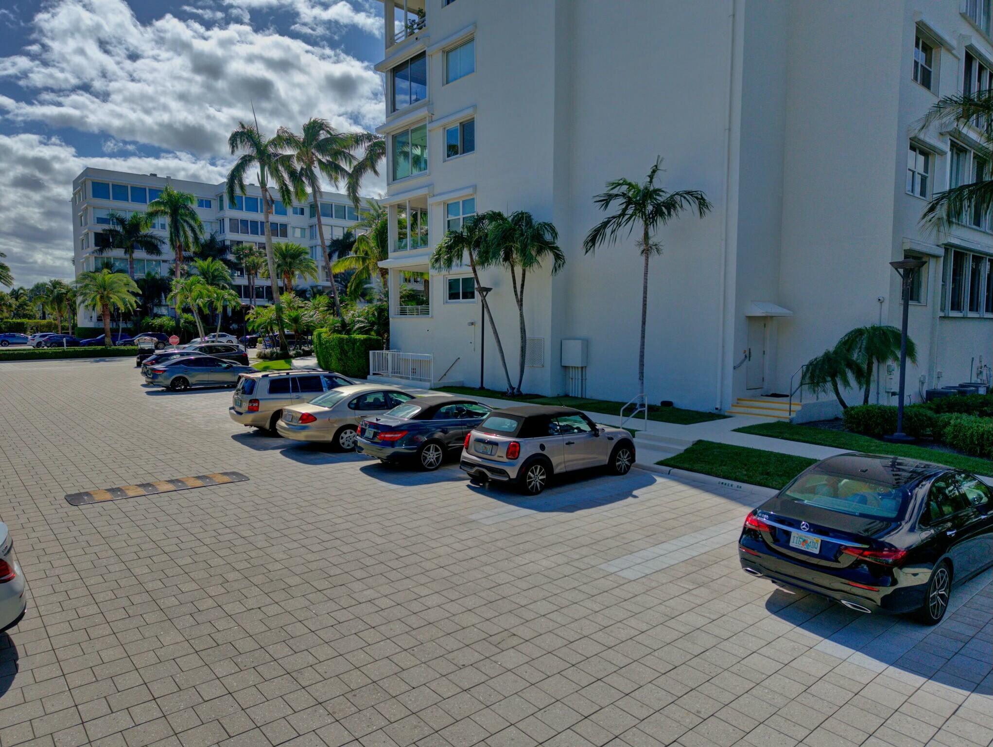 44 Cocoanut Row, Unit 104A Palm Beach, FL 33480 - Photo 23 of 26 a car parked in front of a building
