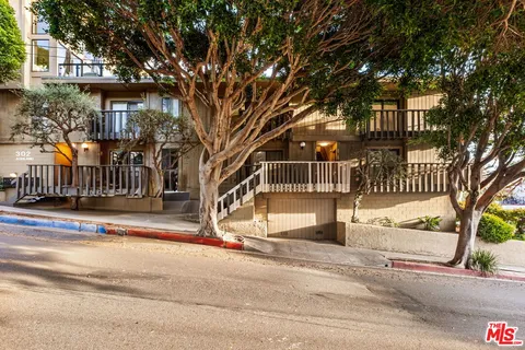 a view of a house with a street