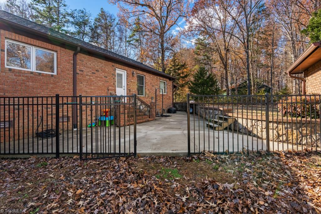 6238 Davis Mill Road Randleman, NC 27317 - Photo 29 of 46 Fenced patio