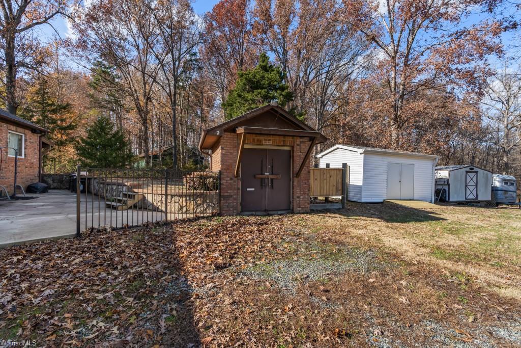 6238 Davis Mill Road Randleman, NC 27317 - Photo 31 of 46 Pump house and storage buildings