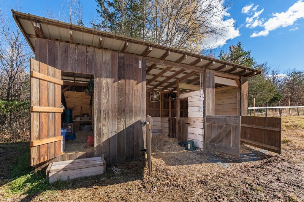 6238 Davis Mill Road Randleman, NC 27317 - Photo 36 of 46 Rear barn and tack room