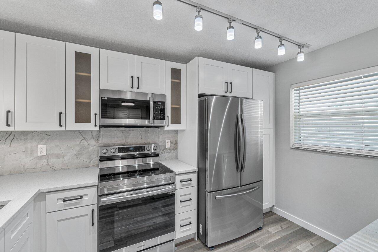 2945 Southwest 22nd Avenue, Unit 2070 Delray Beach, FL 33445 - Photo 2 of 29 014-2945Southwest22ndAvenue-DelrayBeach-