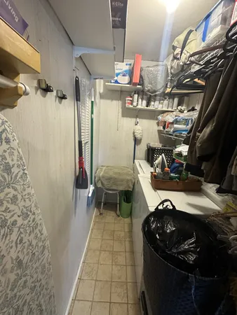 a room with storage and utility