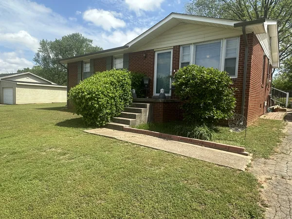 front view of house with a yard