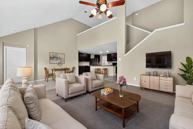 a living room with furniture or couch and a flat screen tv