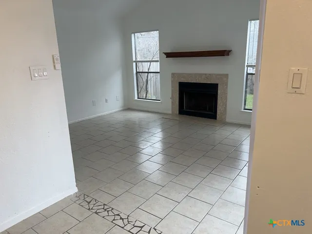 an empty room with windows