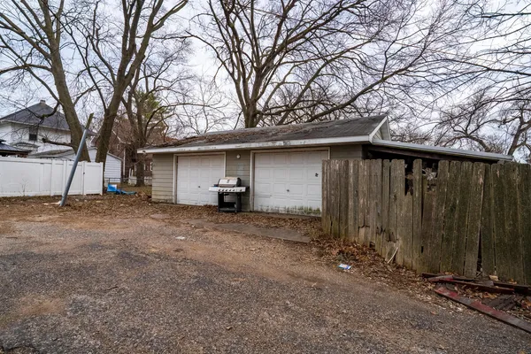 a view of a house with a back yard