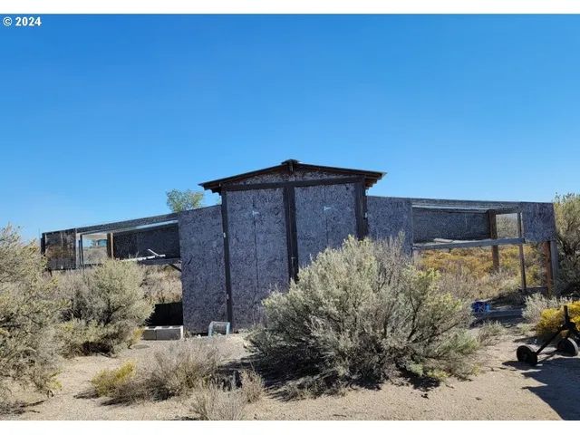 a yellow house with a outdoor space