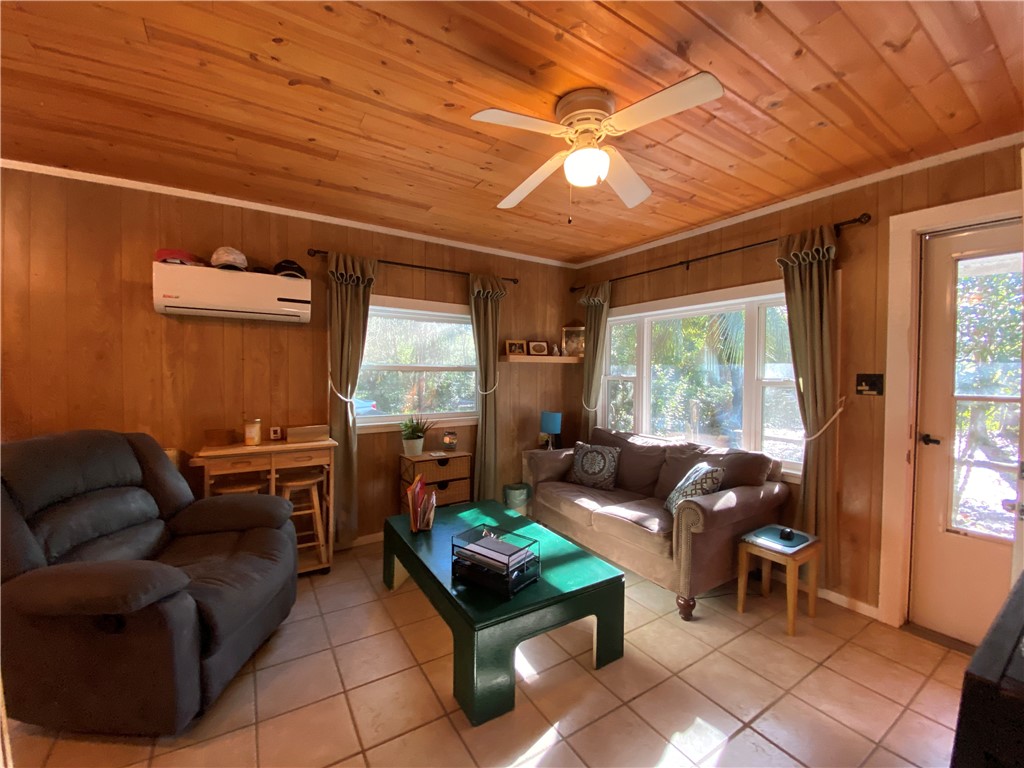 96837 Chester Road Yulee, FL 32097 - Photo 5 of 14 a living room with furniture and a large window