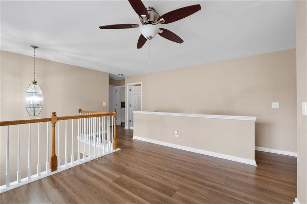 19 Creekside View Hiram, GA 30141 - Photo 19 of 46 a view of an empty room with wooden floor