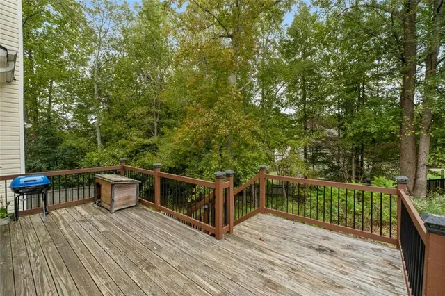 a view of house with backyard