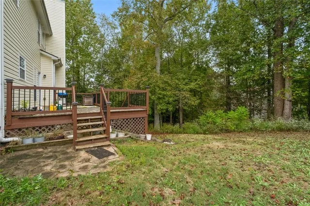 a view of a house with a back yard
