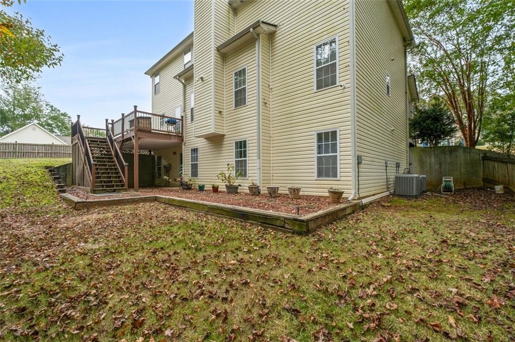 19 Creekside View Hiram, GA 30141 - Photo 40 of 46 a front view of a house with garden