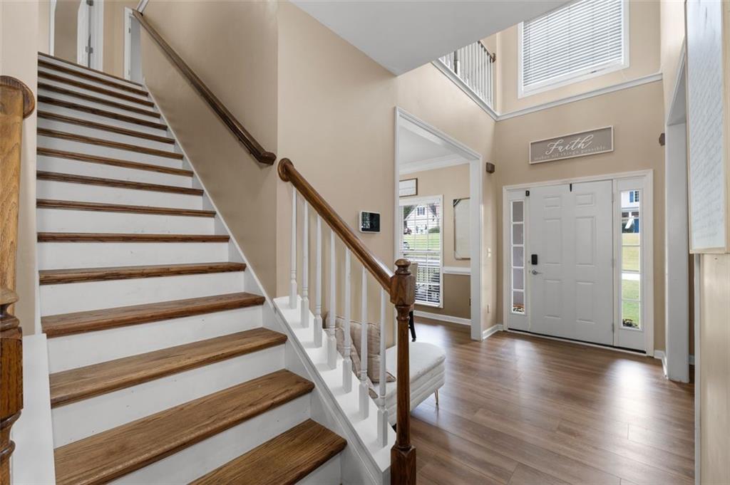 19 Creekside View Hiram, GA 30141 - Photo 8 of 46 a view of entryway with wooden floor and stairs