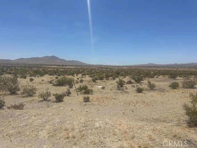 0 Bonanza Trail Oro Grande, CA 92368 - Photo 1 of 5 a view of beach and mountain