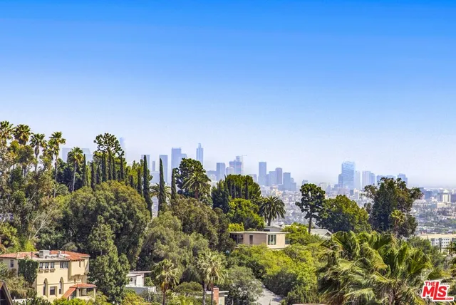 a view of a city with tall buildings