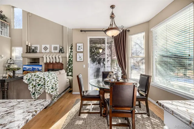 a view of a dining room with furniture window and outside view