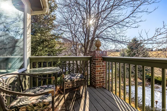 a view of balcony with furniture