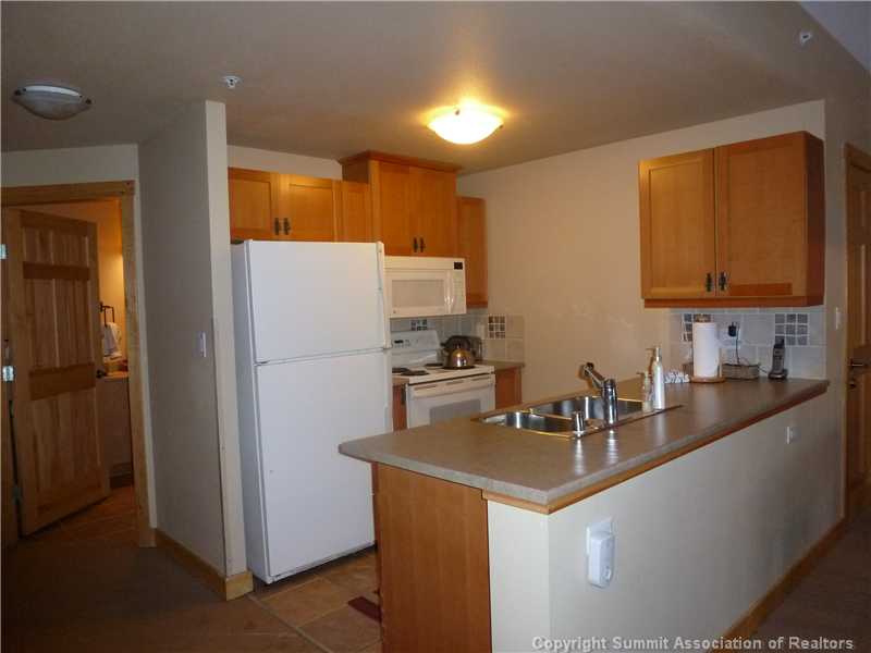 910 Copper Road, Unit 611 Frisco, CO 80443 - Photo 8 of 22 Kitchen. Time to cook up that meal after an enjoyable day in Copper Mountain...