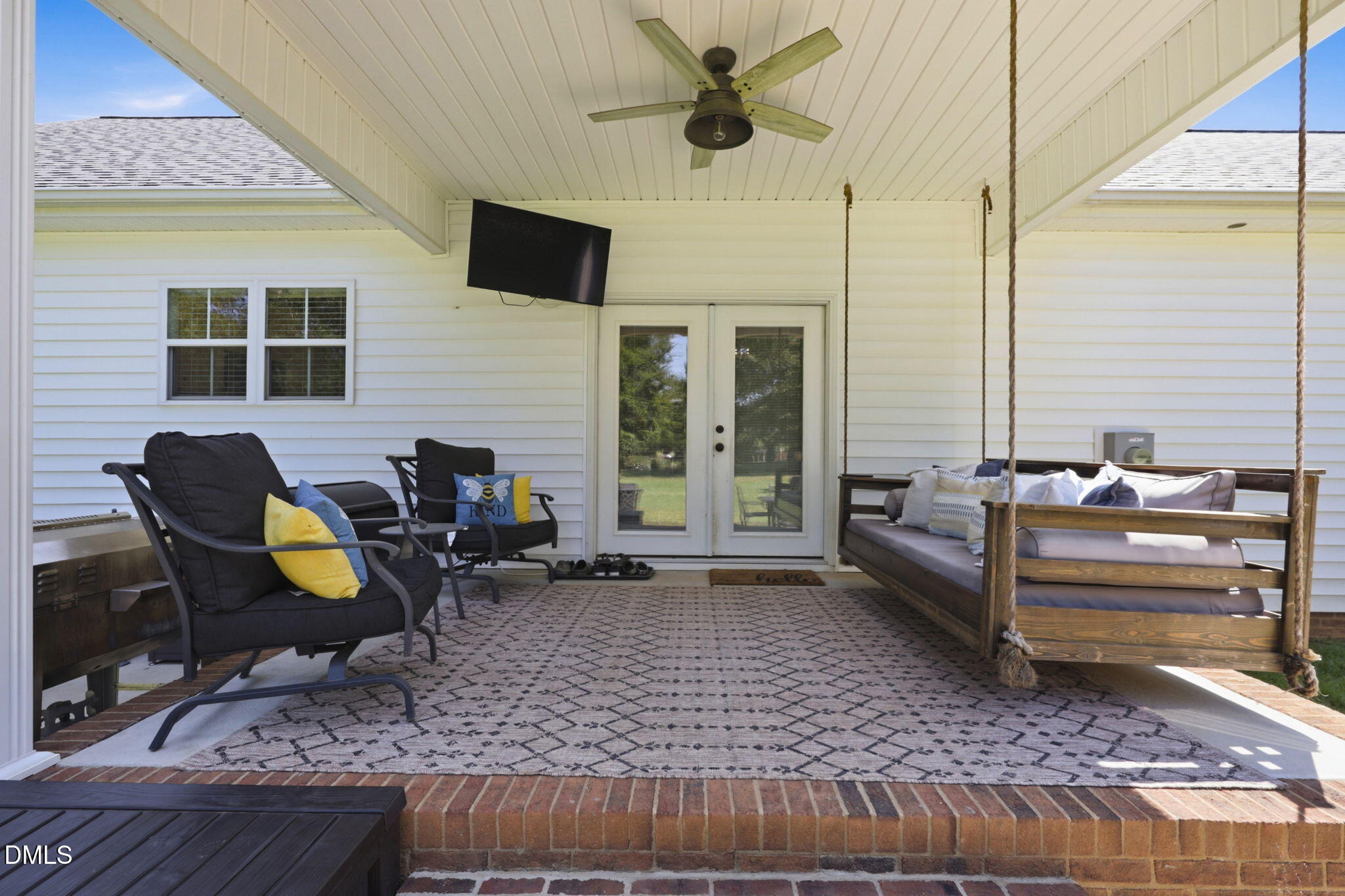 3632 Warfield Road Graham, NC 27253 - Photo 24 of 40 Covered Rear Porch with Porch Bed Swing