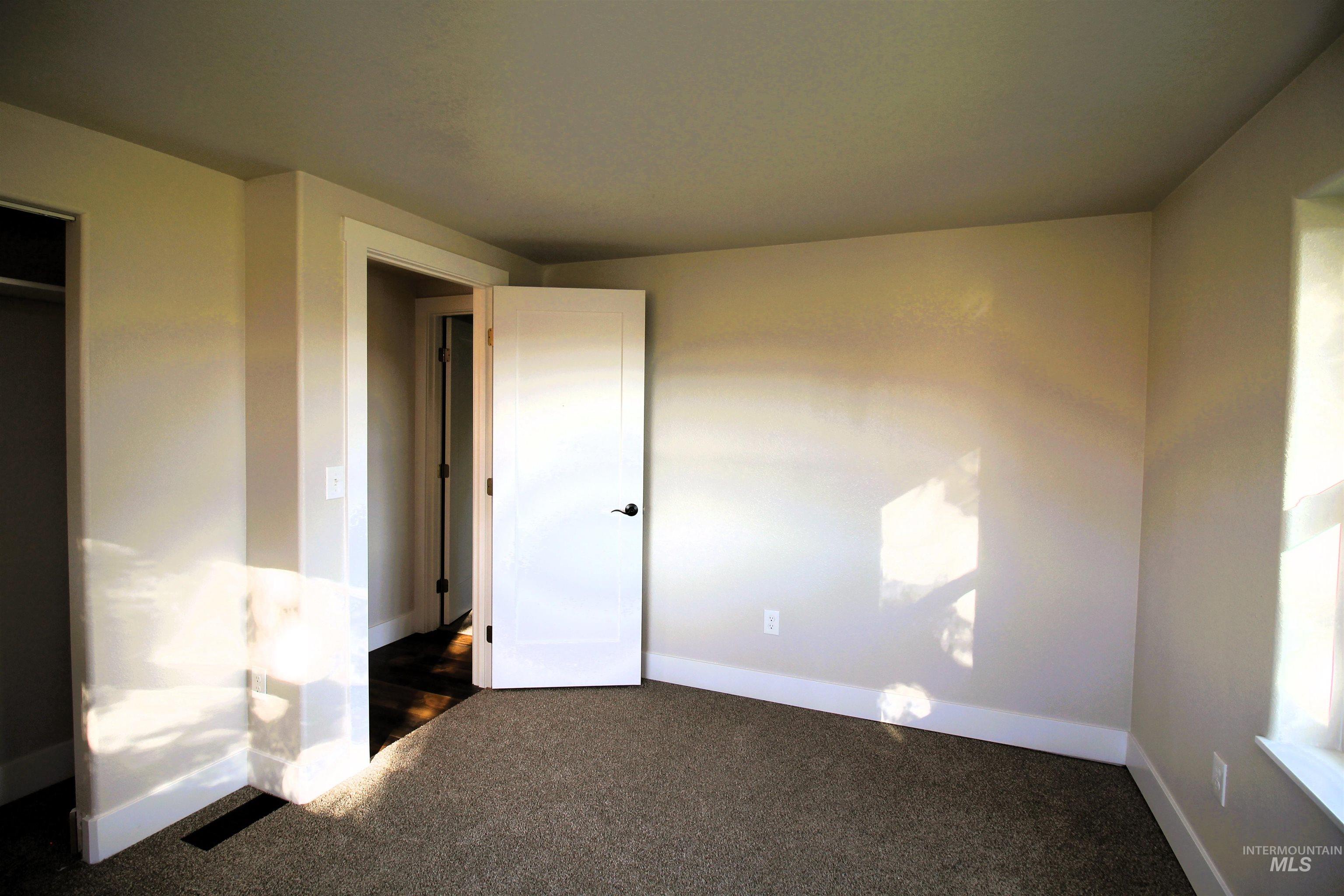 2253 Waite Road Midvale, ID 83645 - Photo 23 of 49 Unfurnished bedroom featuring baseboards and carpet floors