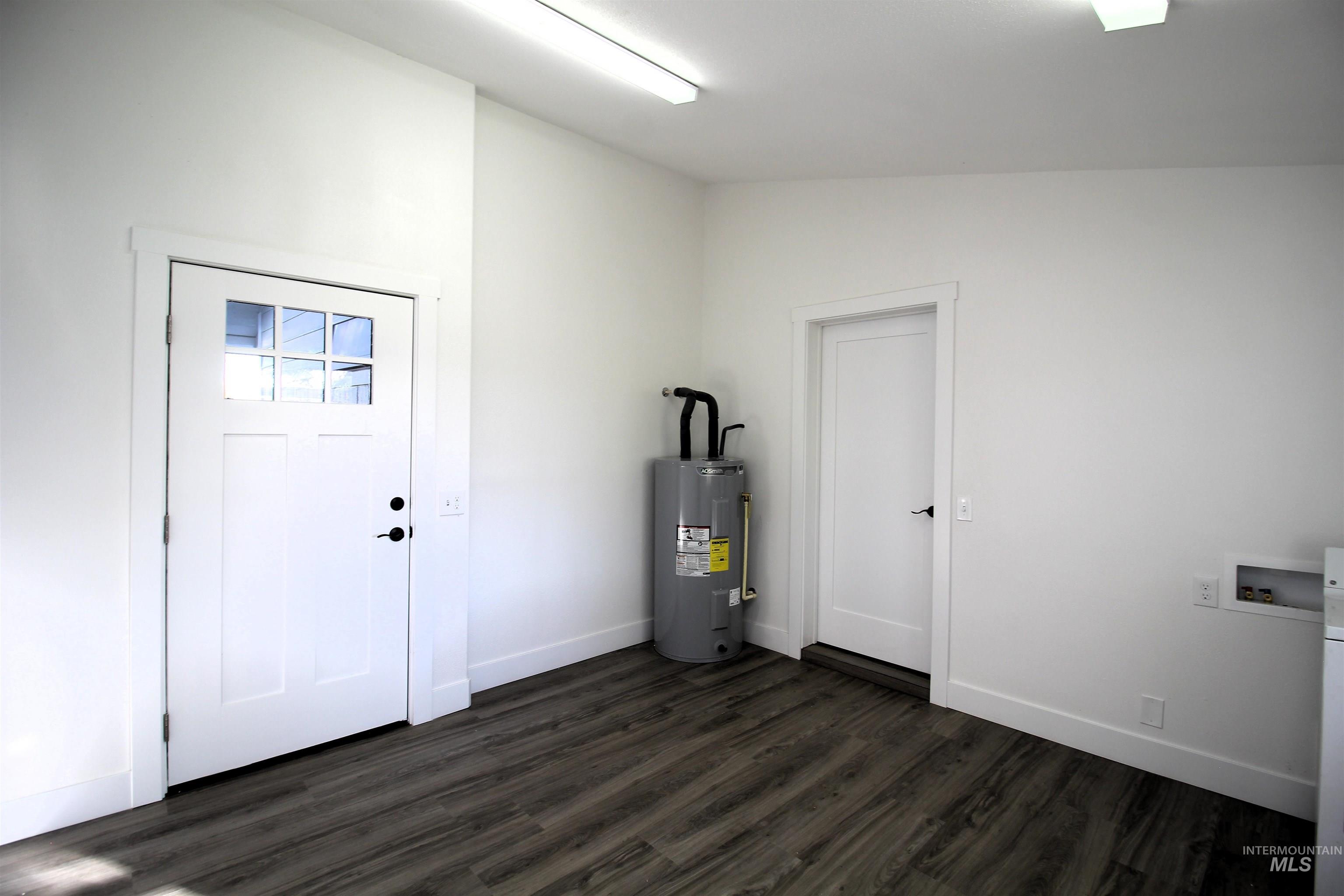 2253 Waite Road Midvale, ID 83645 - Photo 36 of 49 Utility room featuring electric water heater