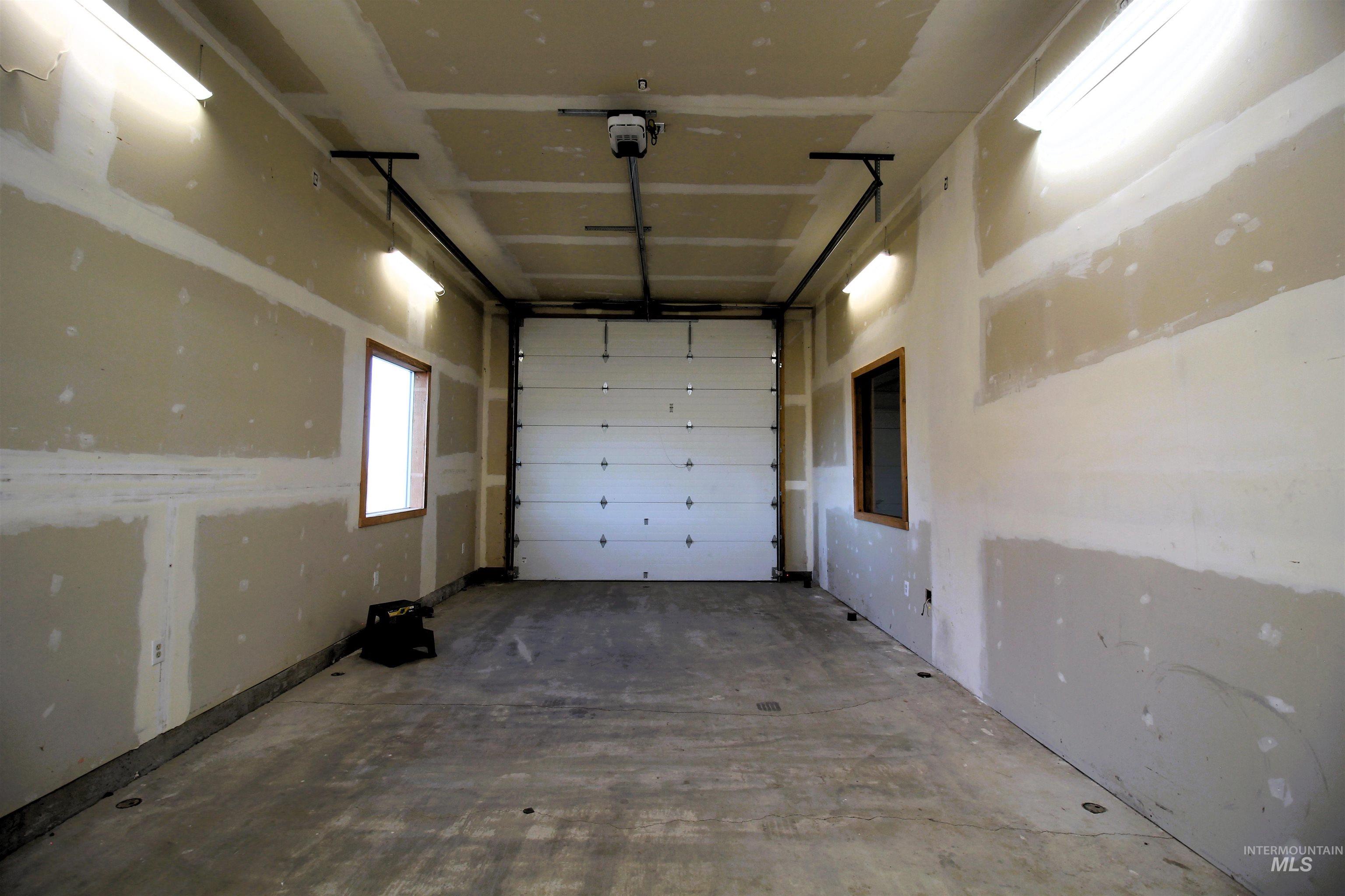 2253 Waite Road Midvale, ID 83645 - Photo 37 of 49 Garage featuring a garage door opener