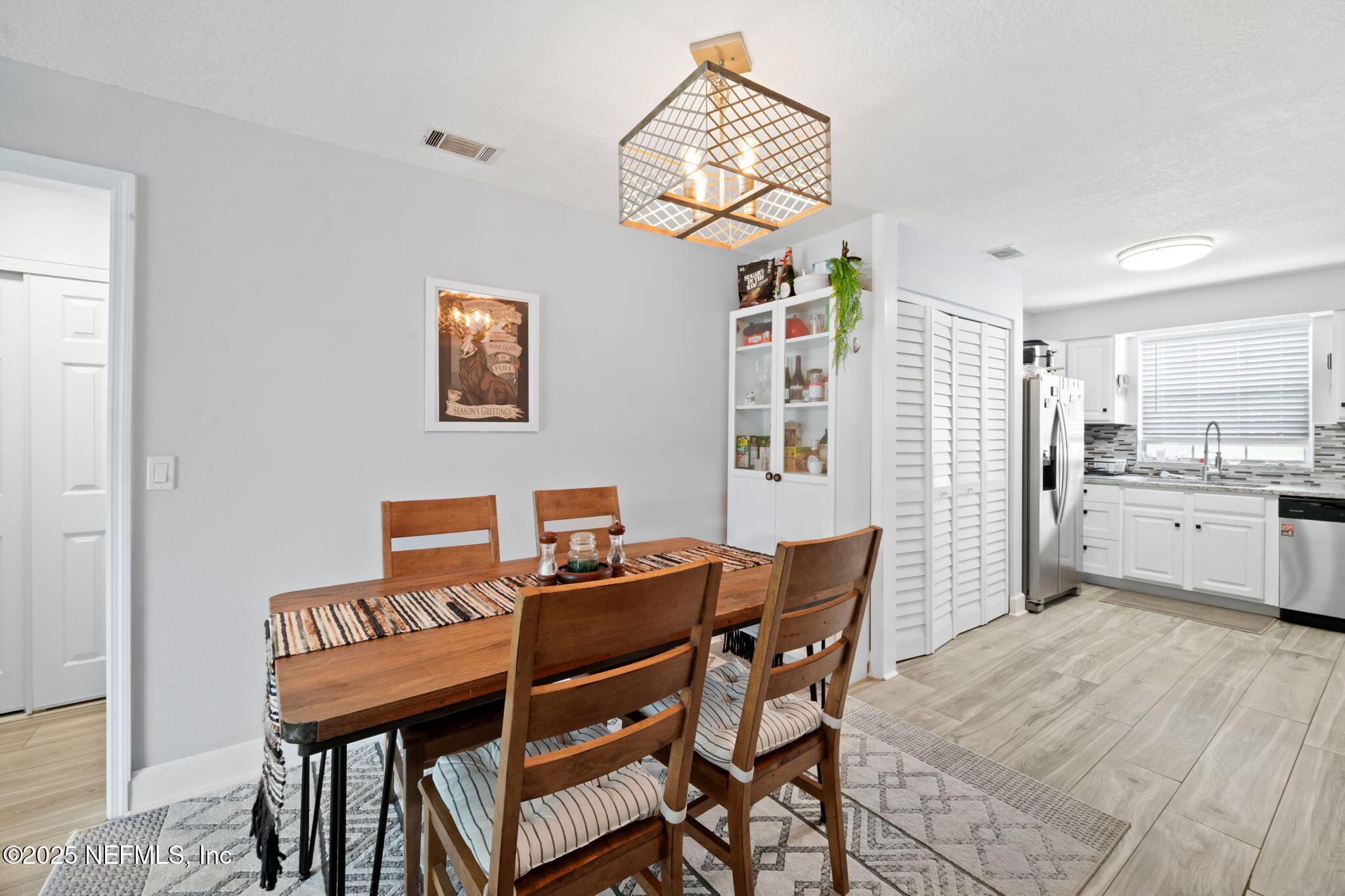 4915 Baymeadows Road, Unit 8H Jacksonville, FL 32217 - Photo 1 of 20 a view of a dining room with furniture