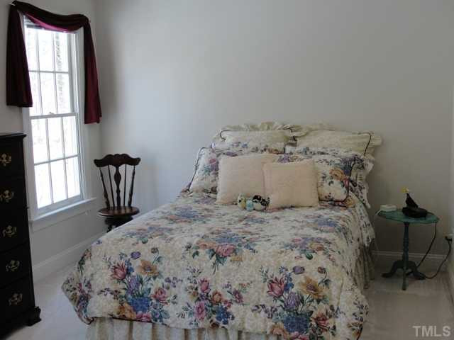 6212 Rein Street Raleigh, NC 27613 - Photo 10 of 12 Back bedroom. Jack and Jill bath between the other bedroom. Bedroom