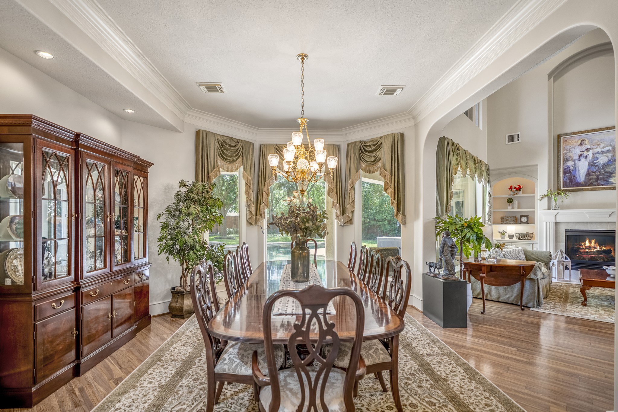 8806 Sterling Gate Circle Spring, TX 77379 - Photo 10 of 40 Formal dining room is open to the living room with views of the fabulous back yard.