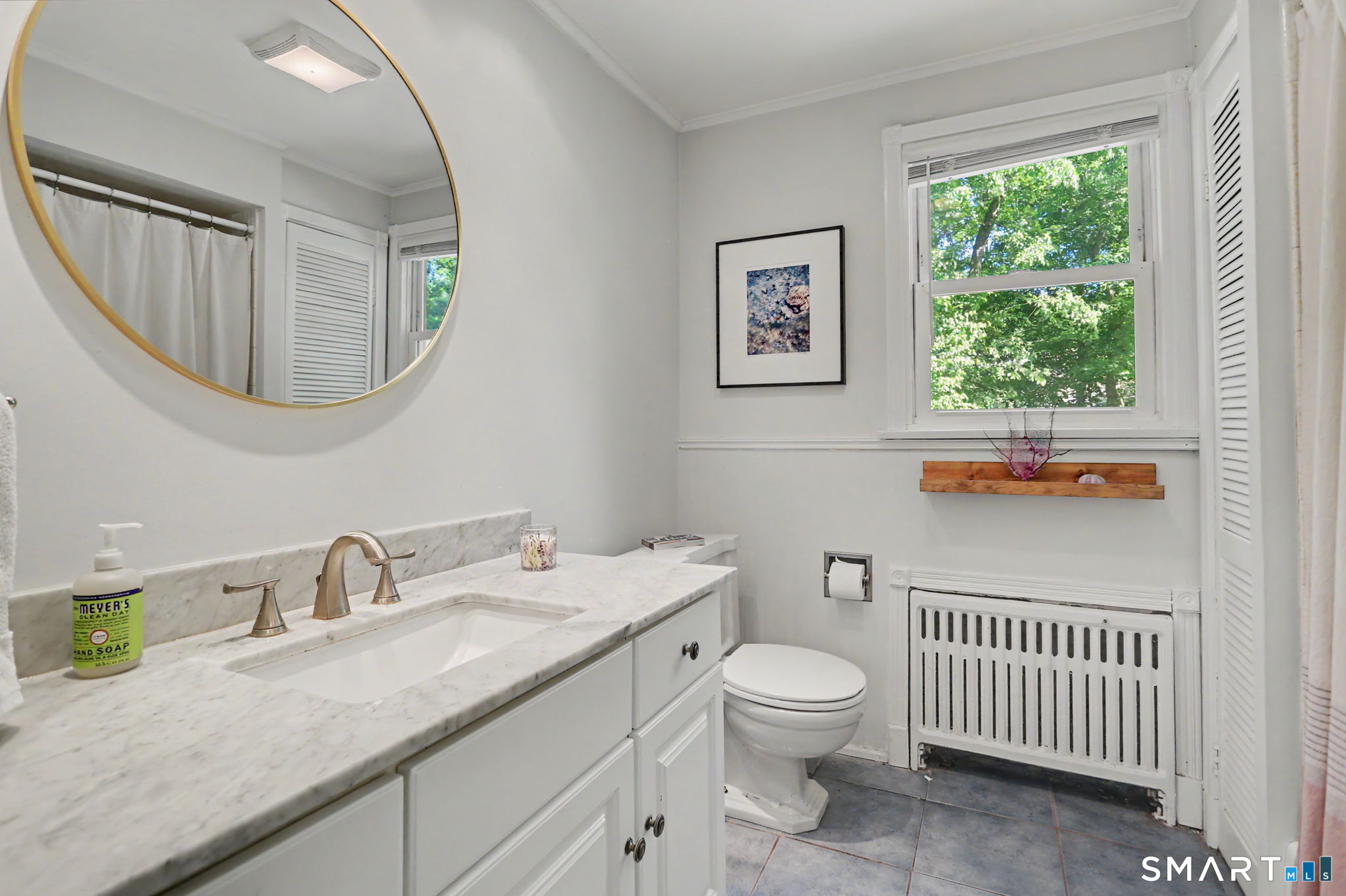 2 Rising Road Norwalk, CT 06850 - Photo 13 of 33 a bathroom with a granite countertop sink a toilet and a mirror