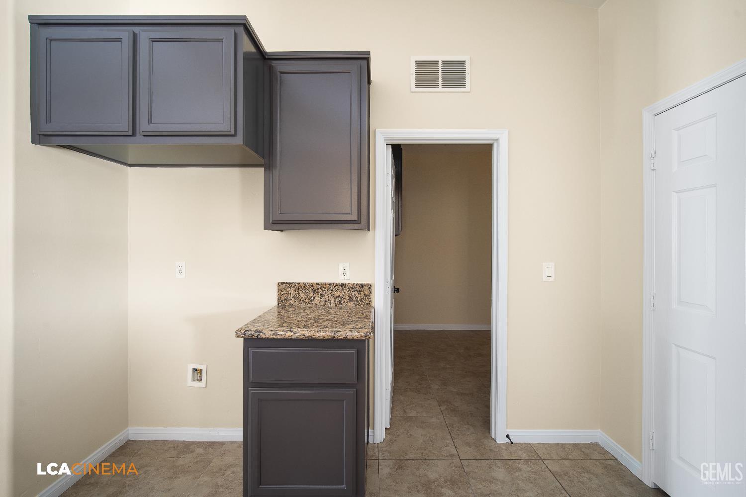 Undisclosed Address Shafter, CA 93263 - Photo 19 of 29 a bathroom with a sink and a mirror