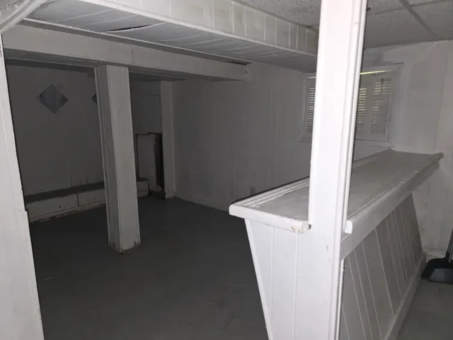 a view of a backyard with pathway