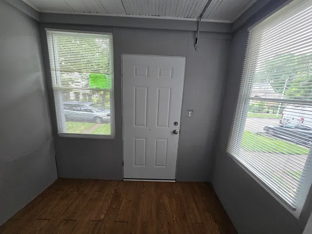 a view of an empty room and window