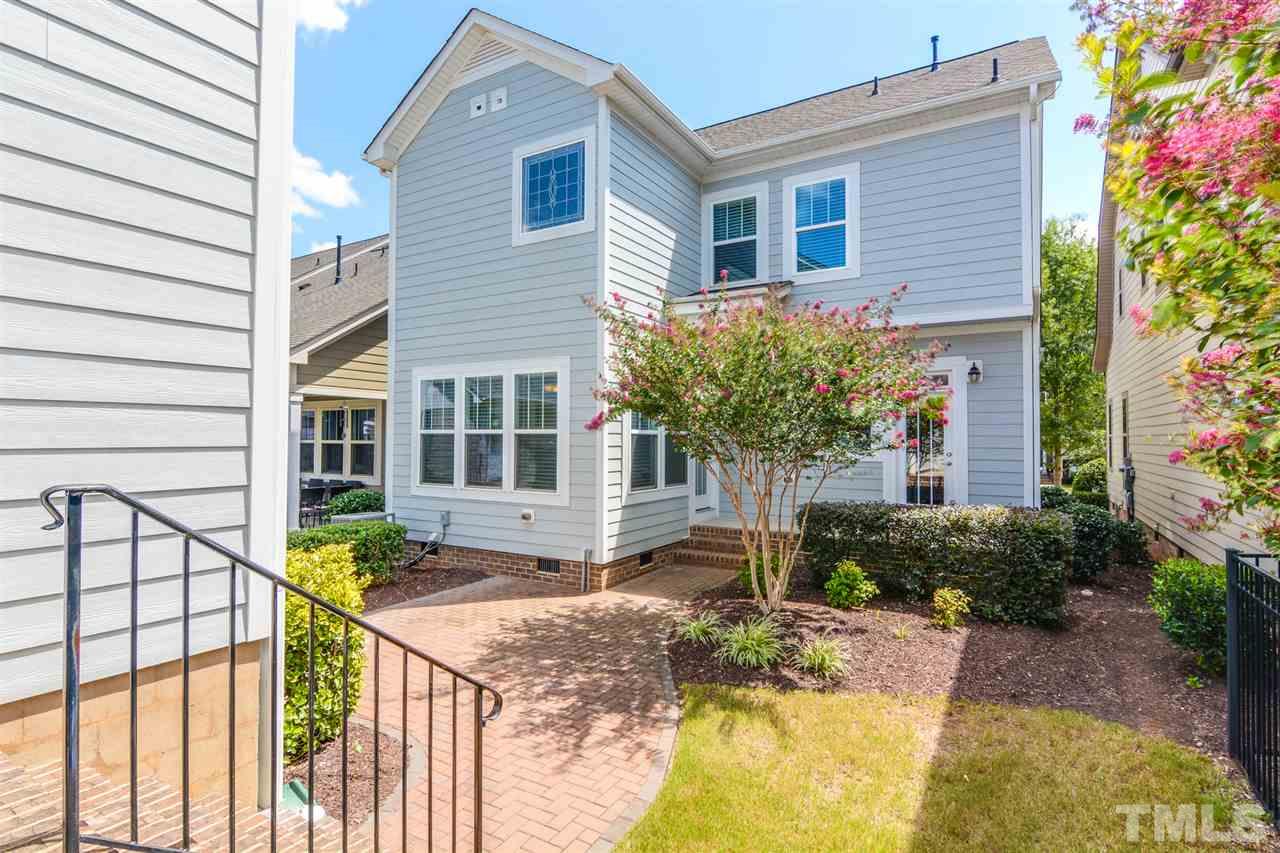 5646 Wade Park Boulevard Raleigh, NC 27607 - Photo 18 of 20 a view of house with swimming pool and sitting area