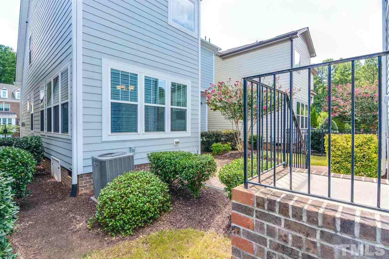 5646 Wade Park Boulevard Raleigh, NC 27607 - Photo 19 of 20 a house view with a garden space