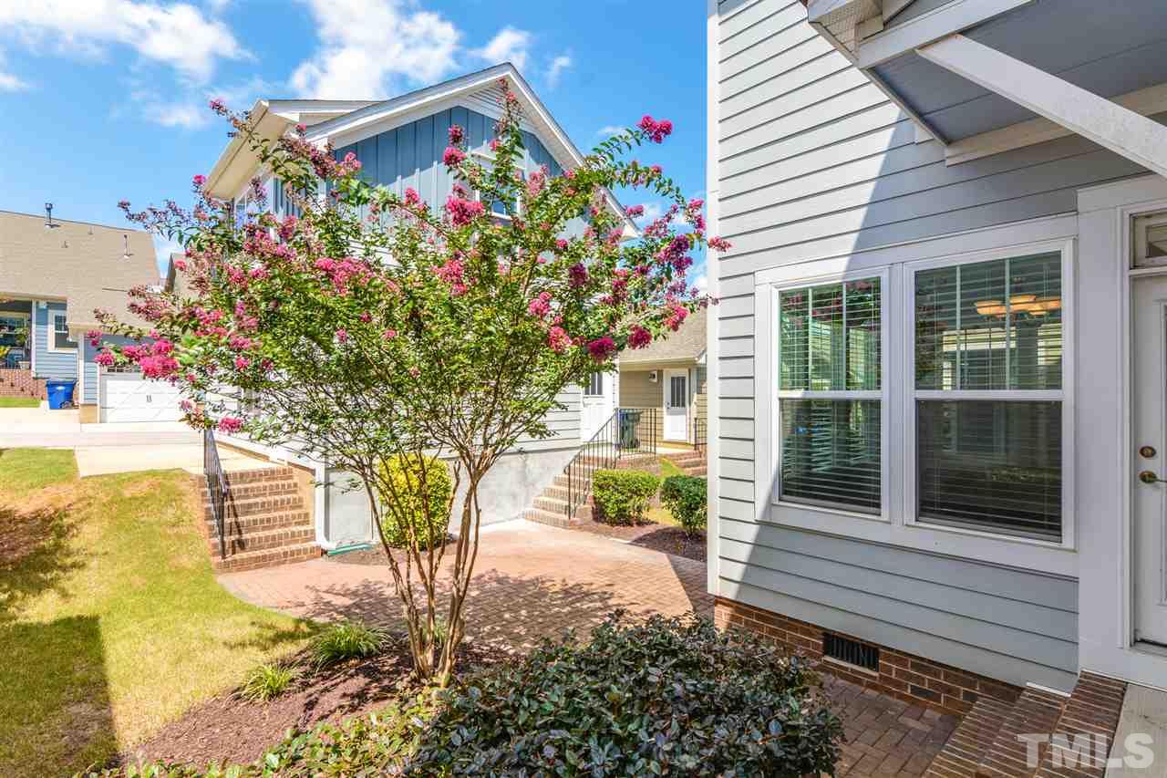 5646 Wade Park Boulevard Raleigh, NC 27607 - Photo 5 of 20 a small garden in the corner of a house