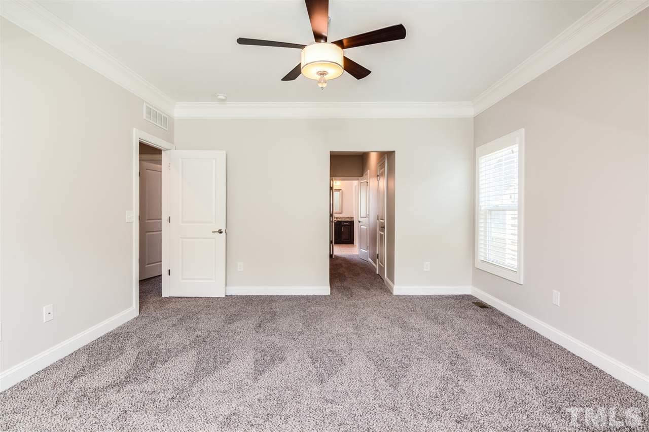 5646 Wade Park Boulevard Raleigh, NC 27607 - Photo 9 of 20 a view of an empty room with a window