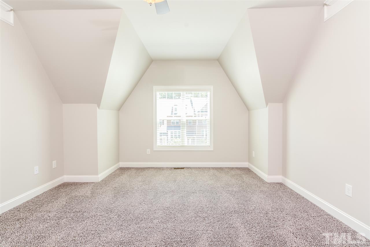 5646 Wade Park Boulevard Raleigh, NC 27607 - Photo 10 of 20 an empty room with a window