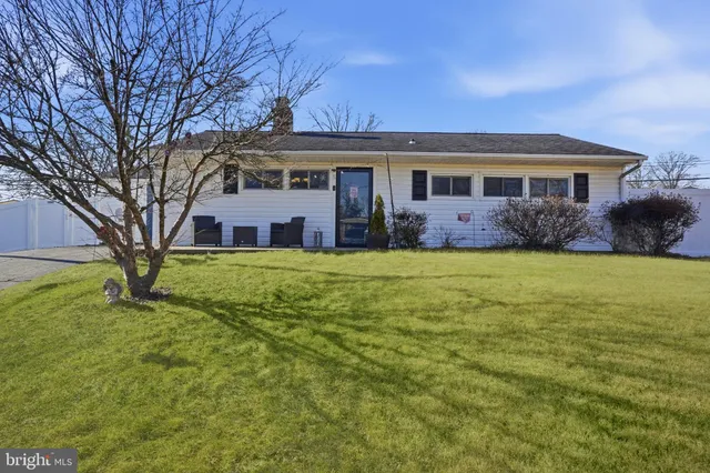 a view of a house with a big yard