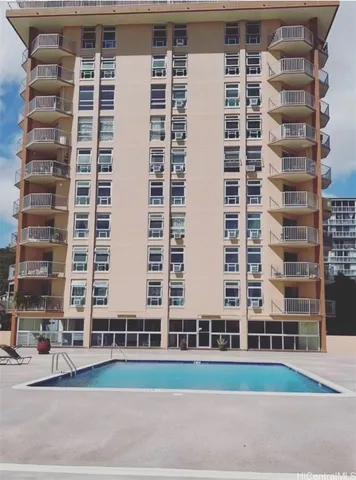 a view of a building with a street