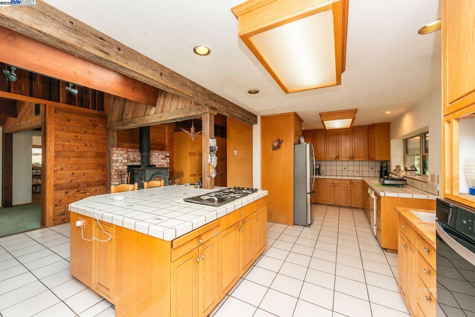 4481 Rush Creek Road Lewiston, CA 96052 - Photo 13 of 50 a kitchen with stainless steel appliances granite countertop a stove a sink and a refrigerator