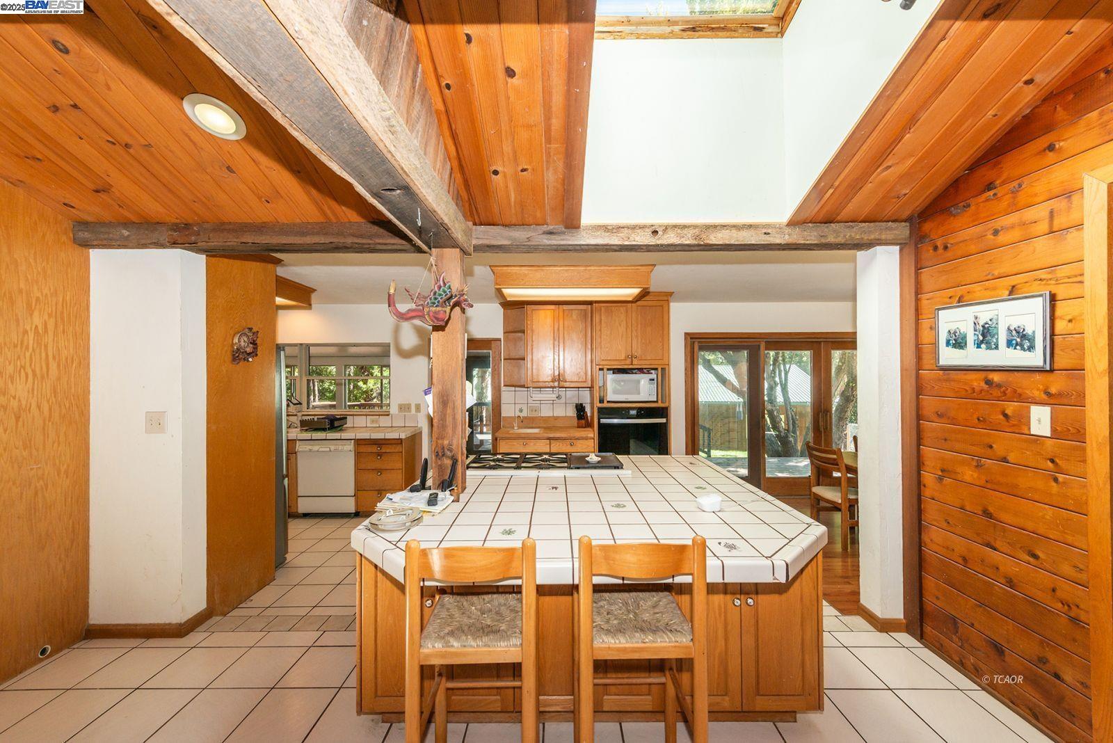 4481 Rush Creek Road Lewiston, CA 96052 - Photo 15 of 50 a view of a dining room with furniture window and wooden floor