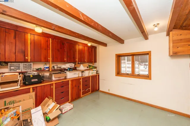 a bed room with a bed and a window