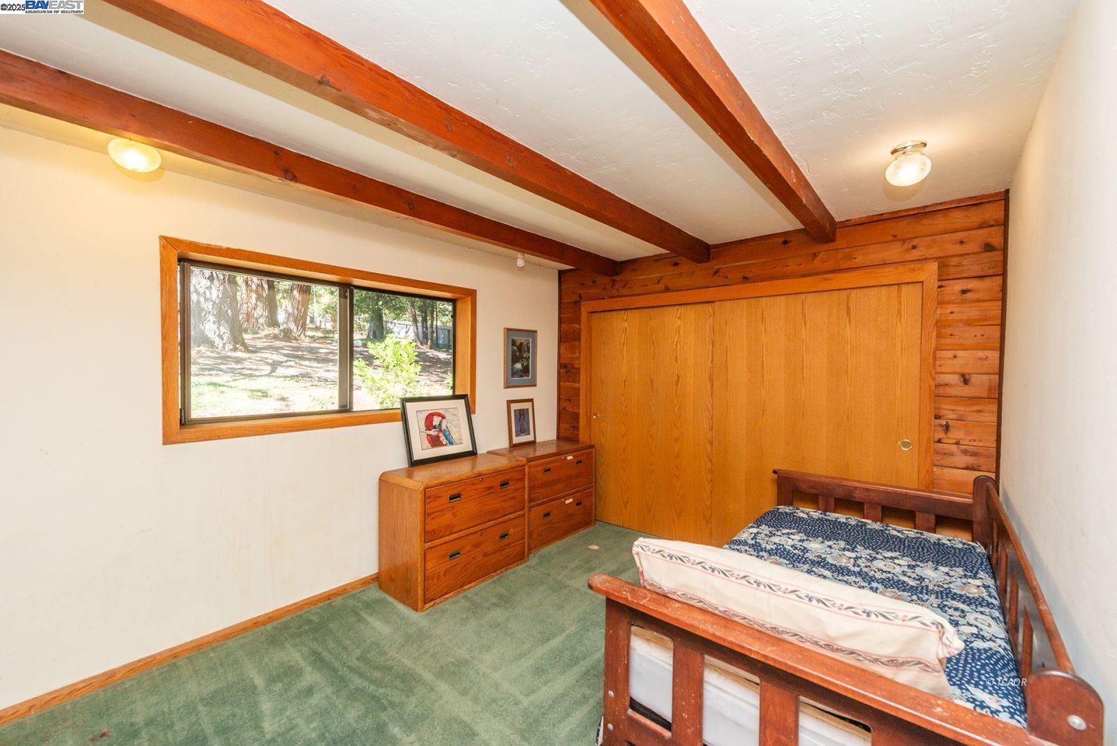 4481 Rush Creek Road Lewiston, CA 96052 - Photo 25 of 50 a bed room with a bed and a window